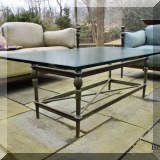 L02. Glass and metal outdoor coffee table. 19” x 54”w x 32”d 